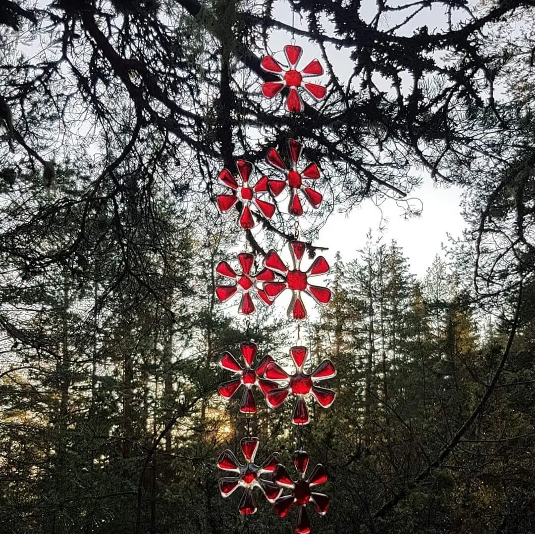 Blommor på rad av Ulrika Lööf