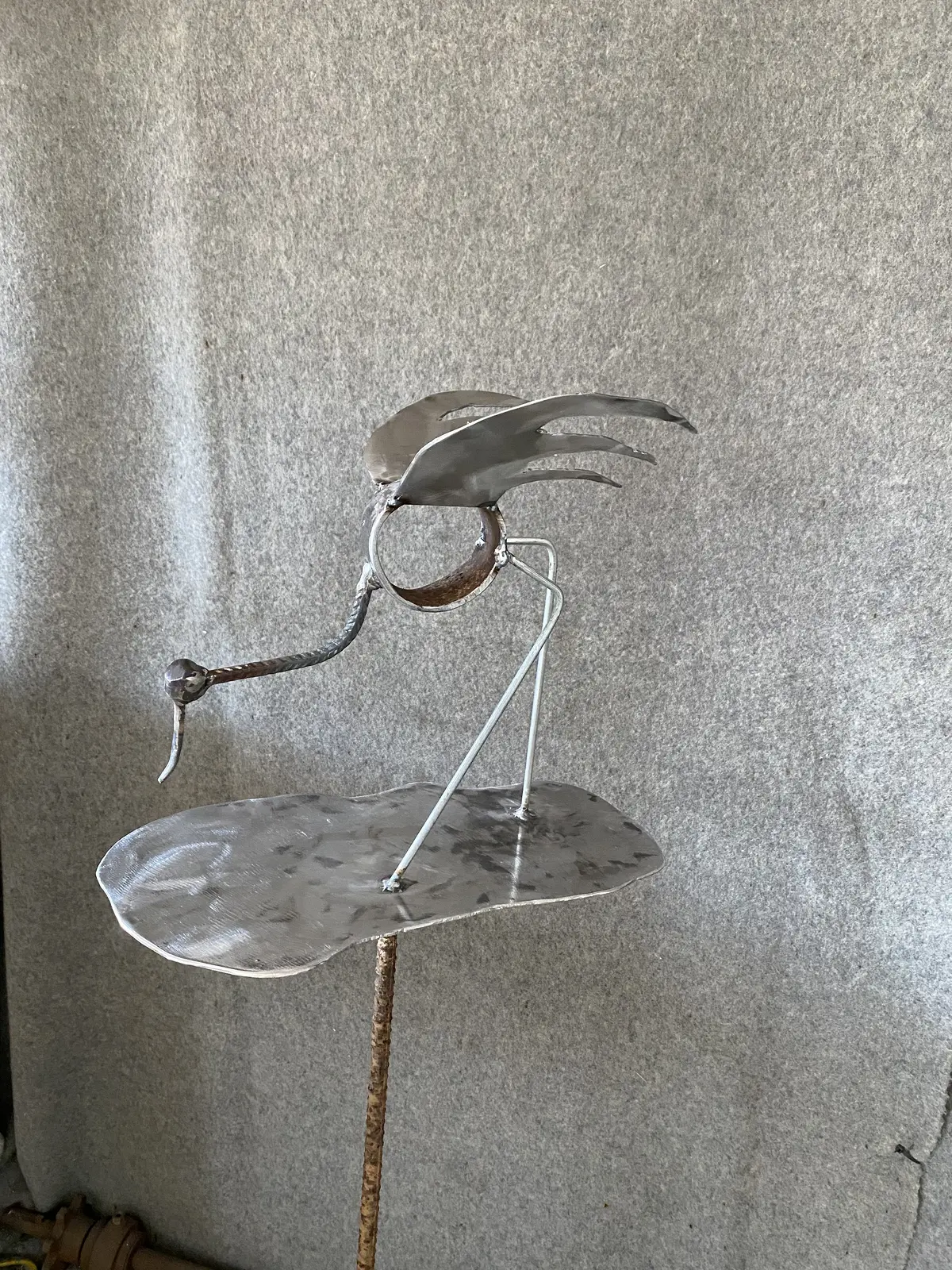 Skulptur Fågel i vatten av Stefan Skimutis