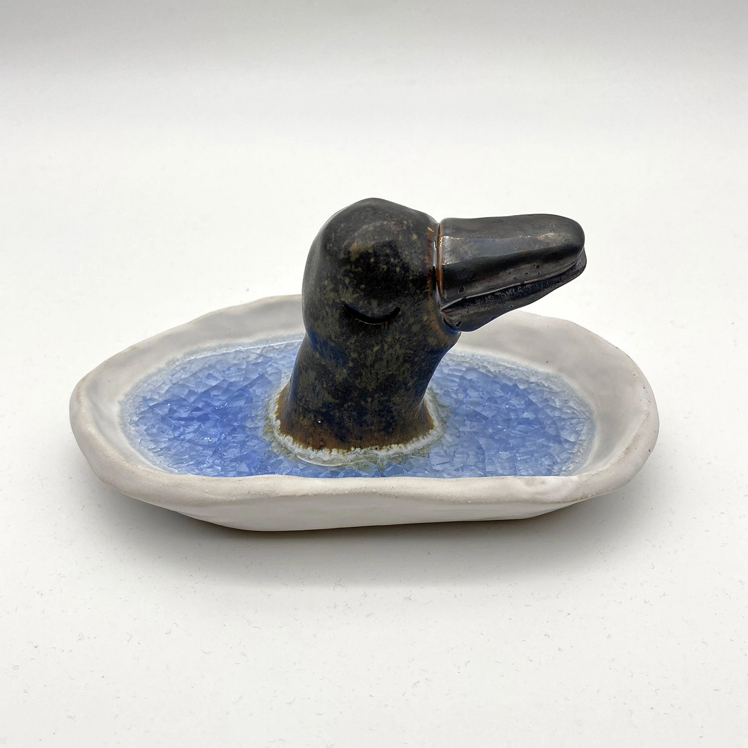 Skulptur Vilodjur (nummer 82) "Efter vilan kommer lugnet". av Daniel Holking