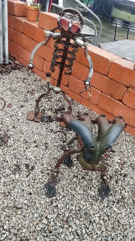 Skulptur Gubbe med hund av Daniel Albinsson