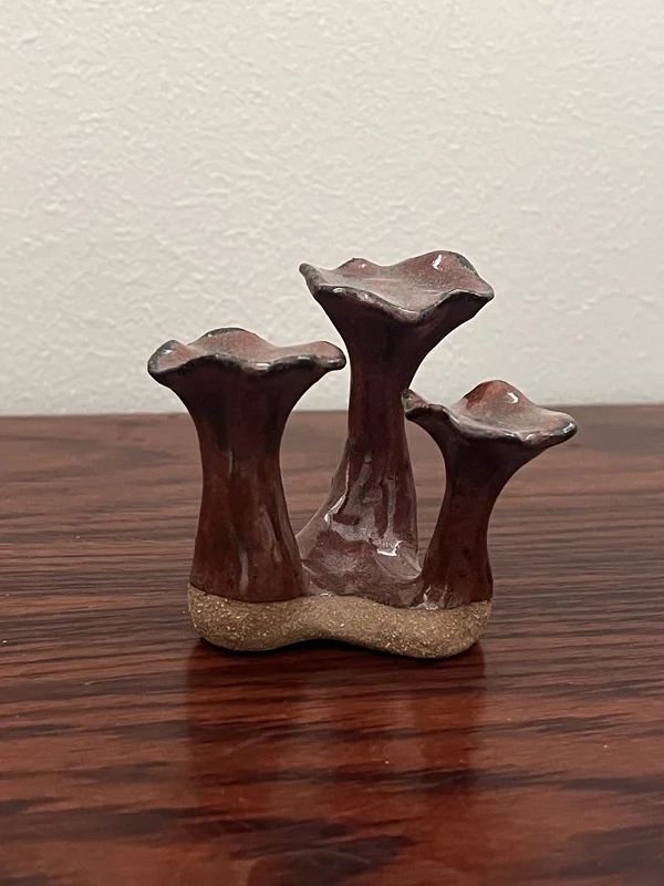 Skulptur Kantarelltrio av Havtornan